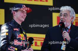 Race winner Max Verstappen (NLD) Red Bull Racing on the podium with Placido Domingo (ESP) Opera Singer. 15.05.2016. Formula 1 World Championship, Rd 5, Spanish Grand Prix, Barcelona, Spain, Race Day.