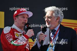 Kimi Raikkonen (FIN) Ferrari on the podium with Placido Domingo (ESP) Opera Singer. 15.05.2016. Formula 1 World Championship, Rd 5, Spanish Grand Prix, Barcelona, Spain, Race Day.
