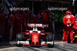 Sebastian Vettel (GER) Ferrari SF16-H makes a pit stop. 15.05.2016. Formula 1 World Championship, Rd 5, Spanish Grand Prix, Barcelona, Spain, Race Day.