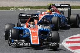 Pascal Wehrlein (GER) Manor Racing MRT05 leads team mate Rio Haryanto (IDN) Manor Racing MRT05. 15.05.2016. Formula 1 World Championship, Rd 5, Spanish Grand Prix, Barcelona, Spain, Race Day.