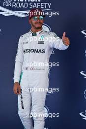 Lewis Hamilton (GBR) Mercedes AMG F1 celebrates his pole position in parc ferme. 14.05.2016. Formula 1 World Championship, Rd 5, Spanish Grand Prix, Barcelona, Spain, Qualifying Day.