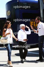 Bernie Ecclestone (GBR) with his wife Fabiana Flosi (BRA), passing Matteo Bonciani (ITA) FIA Media Delegate. 14.05.2016. Formula 1 World Championship, Rd 5, Spanish Grand Prix, Barcelona, Spain, Qualifying Day.