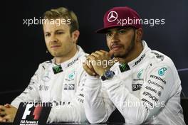 (L to R): Nico Rosberg (GER) Mercedes AMG F1 and team mate Lewis Hamilton (GBR) Mercedes AMG F1 in the post qualifying FIA Press Conference. 14.05.2016. Formula 1 World Championship, Rd 5, Spanish Grand Prix, Barcelona, Spain, Qualifying Day.