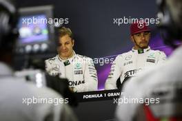 (L to R): Nico Rosberg (GER) Mercedes AMG F1 and team mate Lewis Hamilton (GBR) Mercedes AMG F1 in the post qualifying FIA Press Conference. 14.05.2016. Formula 1 World Championship, Rd 5, Spanish Grand Prix, Barcelona, Spain, Qualifying Day.