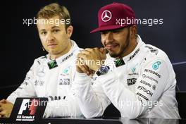 (L to R): Nico Rosberg (GER) Mercedes AMG F1 and team mate Lewis Hamilton (GBR) Mercedes AMG F1 in the post qualifying FIA Press Conference. 14.05.2016. Formula 1 World Championship, Rd 5, Spanish Grand Prix, Barcelona, Spain, Qualifying Day.