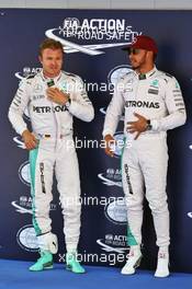 (L to R): Nico Rosberg (GER) Mercedes AMG F1 with team mate and pole sitter Lewis Hamilton (GBR) Mercedes AMG F1 in parc ferme. 14.05.2016. Formula 1 World Championship, Rd 5, Spanish Grand Prix, Barcelona, Spain, Qualifying Day.