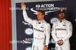 (L to R): Nico Rosberg (GER) Mercedes AMG F1 celebrates his second position in parc ferme with team mate and pole sitter Lewis Hamilton (GBR) Mercedes AMG F1. 14.05.2016. Formula 1 World Championship, Rd 5, Spanish Grand Prix, Barcelona, Spain, Qualifying Day.