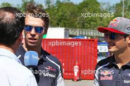 (L to R): Daniil Kvyat (RUS) Scuderia Toro Rosso with team mate Carlos Sainz Jr (ESP) Scuderia Toro Rosso. 12.05.2016. Formula 1 World Championship, Rd 5, Spanish Grand Prix, Barcelona, Spain, Preparation Day.