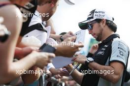 Sergio Perez (MEX) Sahara Force India F1 signs autographs for the fans. 12.05.2016. Formula 1 World Championship, Rd 5, Spanish Grand Prix, Barcelona, Spain, Preparation Day.
