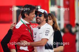 Fernando Alonso (ESP) McLaren (Right) with Massimo Rivola (ITA) Ferrari Driver Academy Director. 12.05.2016. Formula 1 World Championship, Rd 5, Spanish Grand Prix, Barcelona, Spain, Preparation Day.