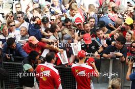Sebastian Vettel (GER) Ferrari signs autographs for the fans. 12.05.2016. Formula 1 World Championship, Rd 5, Spanish Grand Prix, Barcelona, Spain, Preparation Day.