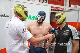 (L to R): Will Buxton (GBR) NBC Sports Network TV Presenter with Blue Demon Jr. (MEX) Luchador and Wrestler and Sergio Perez (MEX) Sahara Force India F1. 12.05.2016. Formula 1 World Championship, Rd 5, Spanish Grand Prix, Barcelona, Spain, Preparation Day.