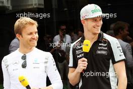 (L to R): Nico Rosberg (GER) Mercedes AMG F1 with Nico Hulkenberg (GER) Sahara Force India F1. 12.05.2016. Formula 1 World Championship, Rd 5, Spanish Grand Prix, Barcelona, Spain, Preparation Day.