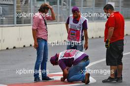 Kerbs are repaired. 17.06.2016. Formula 1 World Championship, Rd 8, European Grand Prix, Baku Street Circuit, Azerbaijan, Practice Day.