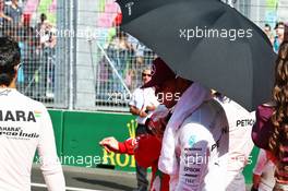 Lewis Hamilton (GBR) Mercedes AMG F1 as the grid observes the national anthem. 19.06.2016. Formula 1 World Championship, Rd 8, European Grand Prix, Baku Street Circuit, Azerbaijan, Race Day.