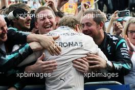 Race winner Nico Rosberg (GER) Mercedes AMG F1 celebrates with the team in parc ferme. 19.06.2016. Formula 1 World Championship, Rd 8, European Grand Prix, Baku Street Circuit, Azerbaijan, Race Day.