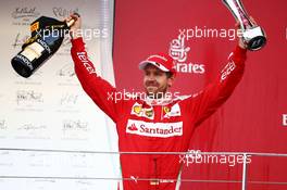 Sebastian Vettel (GER) Ferrari celebrates his second position on the podium. 19.06.2016. Formula 1 World Championship, Rd 8, European Grand Prix, Baku Street Circuit, Azerbaijan, Race Day.