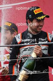 (L to R): Sebastian Vettel (GER) Ferrari celebrates his second position on the podium with third placed Sergio Perez (MEX) Sahara Force India F1. 19.06.2016. Formula 1 World Championship, Rd 8, European Grand Prix, Baku Street Circuit, Azerbaijan, Race Day.