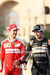 (L to R): Sebastian Vettel (GER) Ferrari with Sergio Perez (MEX) Sahara Force India F1. 19.06.2016. Formula 1 World Championship, Rd 8, European Grand Prix, Baku Street Circuit, Azerbaijan, Race Day.