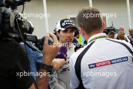 Sergio Perez (MEX) Sahara Force India F1 with the media. 19.06.2016. Formula 1 World Championship, Rd 8, European Grand Prix, Baku Street Circuit, Azerbaijan, Race Day.