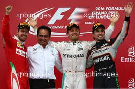 1st place for Nico Rosberg (GER) Mercedes AMG Petronas F1 W07, 2nd for Sebastian Vettel (GER) Scuderia Ferrari SF16-H and 3rd for Sergio Perez (MEX) Force India F1 VJM09. 19.06.2016. Formula 1 World Championship, Rd 8, European Grand Prix, Baku Street Circuit, Azerbaijan, Race Day.