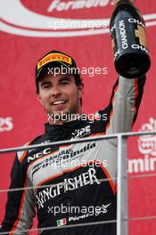 Sergio Perez (MEX) Sahara Force India F1 celebrates his third position on the podium. 19.06.2016. Formula 1 World Championship, Rd 8, European Grand Prix, Baku Street Circuit, Azerbaijan, Race Day.