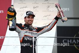 Sergio Perez (MEX) Sahara Force India F1 celebrates his third position on the podium. 19.06.2016. Formula 1 World Championship, Rd 8, European Grand Prix, Baku Street Circuit, Azerbaijan, Race Day.