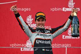 Sergio Perez (MEX) Sahara Force India F1 celebrates his third position on the podium. 19.06.2016. Formula 1 World Championship, Rd 8, European Grand Prix, Baku Street Circuit, Azerbaijan, Race Day.