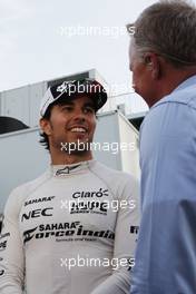 (L to R): Sergio Perez (MEX) Sahara Force India F1 with Johnny Herbert (GBR) Sky Sports F1 Presenter. 19.06.2016. Formula 1 World Championship, Rd 8, European Grand Prix, Baku Street Circuit, Azerbaijan, Race Day.