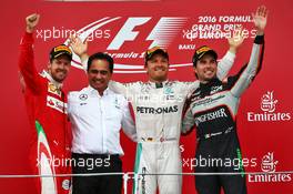 The podium (L to R): Sebastian Vettel (GER) Ferrari, second; Nico Rosberg (GER) Mercedes AMG F1, race winner; Sergio Perez (MEX) Sahara Force India F1, third. 19.06.2016. Formula 1 World Championship, Rd 8, European Grand Prix, Baku Street Circuit, Azerbaijan, Race Day.