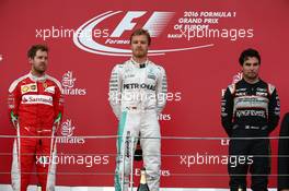 1st place Nico Rosberg (GER) Mercedes AMG Petronas F1 W07, 2nd place Sebastian Vettel (GER) Scuderia Ferrari SF16-H and 3rd place Sergio Perez (MEX) Force India F1 VJM09. 19.06.2016. Formula 1 World Championship, Rd 8, European Grand Prix, Baku Street Circuit, Azerbaijan, Race Day.
