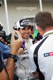 Sergio Perez (MEX) Sahara Force India F1 with the media. 19.06.2016. Formula 1 World Championship, Rd 8, European Grand Prix, Baku Street Circuit, Azerbaijan, Race Day.