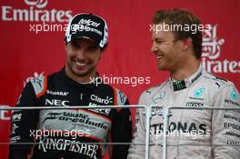 Sergio Perez (MEX) Force India F1 VJM09 and Nico Rosberg (GER) Mercedes AMG Petronas F1 W07. 19.06.2016. Formula 1 World Championship, Rd 8, European Grand Prix, Baku Street Circuit, Azerbaijan, Race Day.