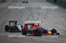 Daniel Ricciardo (AUS) Red Bull Racing RB12 leads Nico Hulkenberg (GER) Sahara Force India F1 VJM09. 19.06.2016. Formula 1 World Championship, Rd 8, European Grand Prix, Baku Street Circuit, Azerbaijan, Race Day.