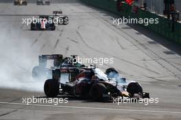 Daniil Kvyat (RUS) Scuderia Toro Rosso STR11 and Nico Hulkenberg (GER) Sahara Force India F1 VJM09 battle for position. 19.06.2016. Formula 1 World Championship, Rd 8, European Grand Prix, Baku Street Circuit, Azerbaijan, Race Day.