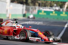 Sebastian Vettel (GER) Ferrari SF16-H with a plastic bag stuck to the front wing. 19.06.2016. Formula 1 World Championship, Rd 8, European Grand Prix, Baku Street Circuit, Azerbaijan, Race Day.