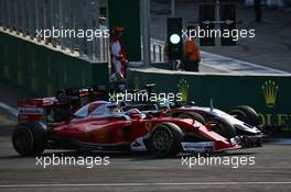 Kimi Raikkonen (FIN) Ferrari SF16-H and Nico Hulkenberg (GER) Sahara Force India F1 VJM09 battle for position. 19.06.2016. Formula 1 World Championship, Rd 8, European Grand Prix, Baku Street Circuit, Azerbaijan, Race Day.