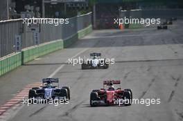 (L to R): Marcus Ericsson (SWE) Sauber C35 and Kimi Raikkonen (FIN) Ferrari SF16-H battle for position. 19.06.2016. Formula 1 World Championship, Rd 8, European Grand Prix, Baku Street Circuit, Azerbaijan, Race Day.