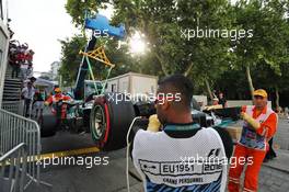 The Mercedes AMG F1 W07 Hybrid of Lewis Hamilton (GBR) Mercedes AMG F1 is craned away after he crashed out of qualifying. 18.06.2016. Formula 1 World Championship, Rd 8, European Grand Prix, Baku Street Circuit, Azerbaijan, Qualifying Day.