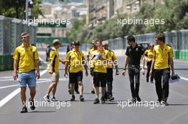 Kevin Magnussen (DEN) Renault Sport F1 Team and Esteban Ocon (FRA) Renault Sport F1 Team Test Driver walk the circuit with the team. 16.06.2016. Formula 1 World Championship, Rd 8, European Grand Prix, Baku Street Circuit, Azerbaijan, Preparation Day.
