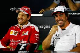 (L to R): Sebastian Vettel (GER) Ferrari and Fernando Alonso (ESP) McLaren in the FIA Press Conference. 16.06.2016. Formula 1 World Championship, Rd 8, European Grand Prix, Baku Street Circuit, Azerbaijan, Preparation Day.