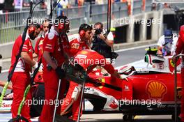 Kimi Raikkonen (FIN) Ferrari SF16-H in the pits. 08.07.2016. Formula 1 World Championship, Rd 10, British Grand Prix, Silverstone, England, Practice Day.