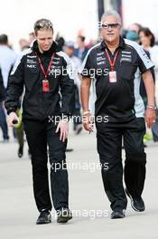 (L to R): Will Hings (GBR) Sahara Force India F1 Press Officer with Dr. Vijay Mallya (IND) Sahara Force India F1 Team Owner. 08.07.2016. Formula 1 World Championship, Rd 10, British Grand Prix, Silverstone, England, Practice Day.