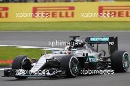 Lewis Hamilton (GBR) Mercedes AMG F1 W07 Hybrid waves to the fans. 08.07.2016. Formula 1 World Championship, Rd 10, British Grand Prix, Silverstone, England, Practice Day.