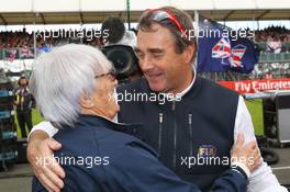 Bernie Ecclestone (GBR) with Nigel Mansell (GBR) FIA Steward on the grid. 10.07.2016. Formula 1 World Championship, Rd 10, British Grand Prix, Silverstone, England, Race Day.