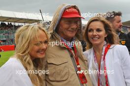 Niki Lauda (AUT) Mercedes Non-Executive Chairman on the grid with Emma Bunton (GBR) Singer (Left) and Geri Halliwell (GBR) Singer (Right). 10.07.2016. Formula 1 World Championship, Rd 10, British Grand Prix, Silverstone, England, Race Day.