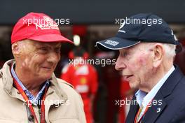 (L to R): Niki Lauda (AUT) Mercedes Non-Executive Chairman with John Surtees (GBR). 10.07.2016. Formula 1 World Championship, Rd 10, British Grand Prix, Silverstone, England, Race Day.