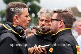 Mario Isola (ITA) Pirelli Racing Manager (Left) with Paul Hembery (GBR) Pirelli Motorsport Director (Right). 10.07.2016. Formula 1 World Championship, Rd 10, British Grand Prix, Silverstone, England, Race Day.