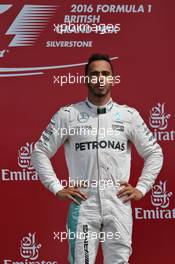 Race winner Lewis Hamilton (GBR) Mercedes AMG F1 celebrates on the podium. 10.07.2016. Formula 1 World Championship, Rd 10, British Grand Prix, Silverstone, England, Race Day.