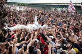 Race winner Lewis Hamilton (GBR) Mercedes AMG F1 celebrates with the fans. 10.07.2016. Formula 1 World Championship, Rd 10, British Grand Prix, Silverstone, England, Race Day.